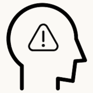 An outline of a head with a caution sign (exclamation point) inside